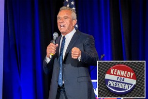 Presidential candidate Robert F. Kennedy Jr. speaking into a microphone at a campaign rally in Brazos Hall, Austin, Texas