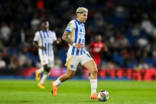 Brighton's French striker #14 Georginio Rutter runs with the ball during the English Premier League football match between Brighton and Hove Albion and Manchester United at the American Express Community Stadium in Brighton, southern England on August 24, 2024.