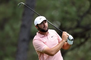 Scottie Scheffler follows his shot from the 12th tee during the second round of the BMW Championship.