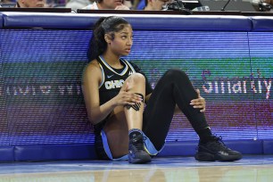 Chicago Sky forward Angel Reese (5) waits to enter the game against the Las Vegas Aces during the first half on Aug. 25, 2024.