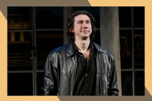 Adam Driver smiles while standing onstage.