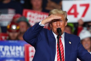 Republican presidential nominee and former President Donald Trump gestures as he holds a rally at the Cambria County War Memorial Arena in Johnstown, Pennsylvania, U.S. August 30, 2024.