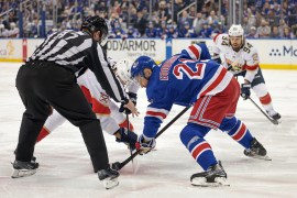 Florida Panthers center Kevin Stenlund facing off against New York Rangers center Barclay Goodrow during a hockey game at the Madison Square Garden.