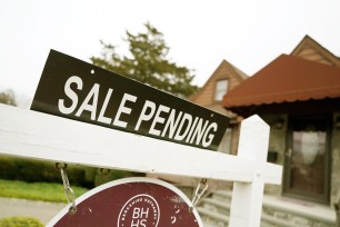 Home with pending sale sign