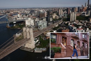 A woman walking on a staircase over a bridge in New York, related to the affordability of rent based on income