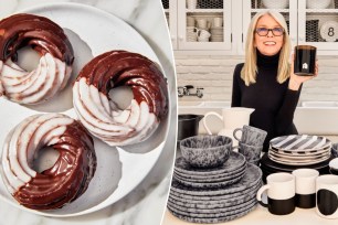 Diane Keaton standing in front of a plate of chocolate covered donuts