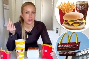 A woman sitting at a table with a McDonald's burger and fries, demonstrating food choices for weight loss