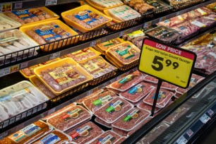 Variety of sausages displayed at the meat counter in a Fred Meyer grocery store in Palmer, Alaska