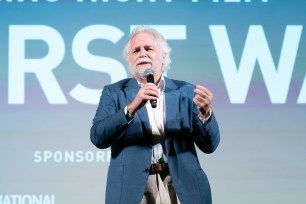 Hamptons International Film Festival Board Chair, Randy Mastro speaks onstage at the World Premiere of National Geographic Documentary Films' 'The First Wave' at Hamptons International Film Festival.